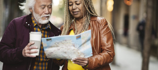 Couple traveling and looking at a map together